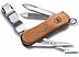 Нож перочинный Victorinox Nail Clip Wood 580 0.6461.63