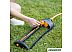 Дождеватель FISKARS 1023662 (черный/оранжевый) Дождеватель FISKARS 1023662 (черный/оранжевый)